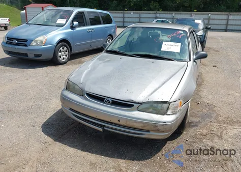 2000 Toyota Corolla Ce z USA, uszkodzony, nr VIN 1NXBR12E8YZ407349